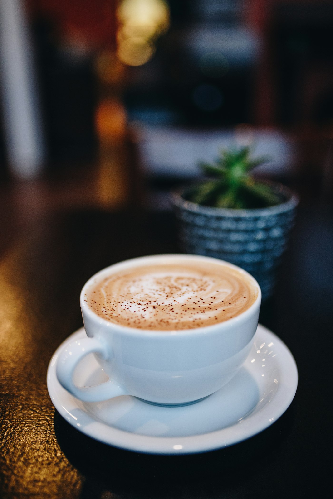 Barista pouring coffee
