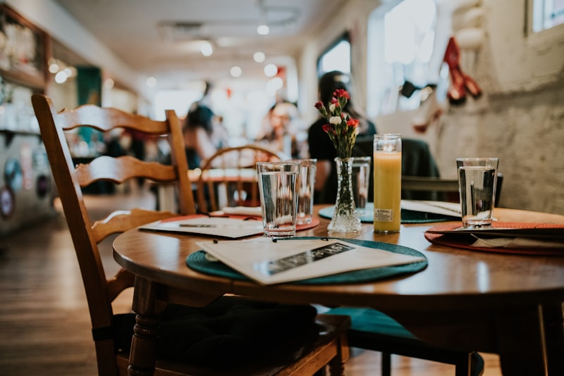 Table set with drinks and flowers